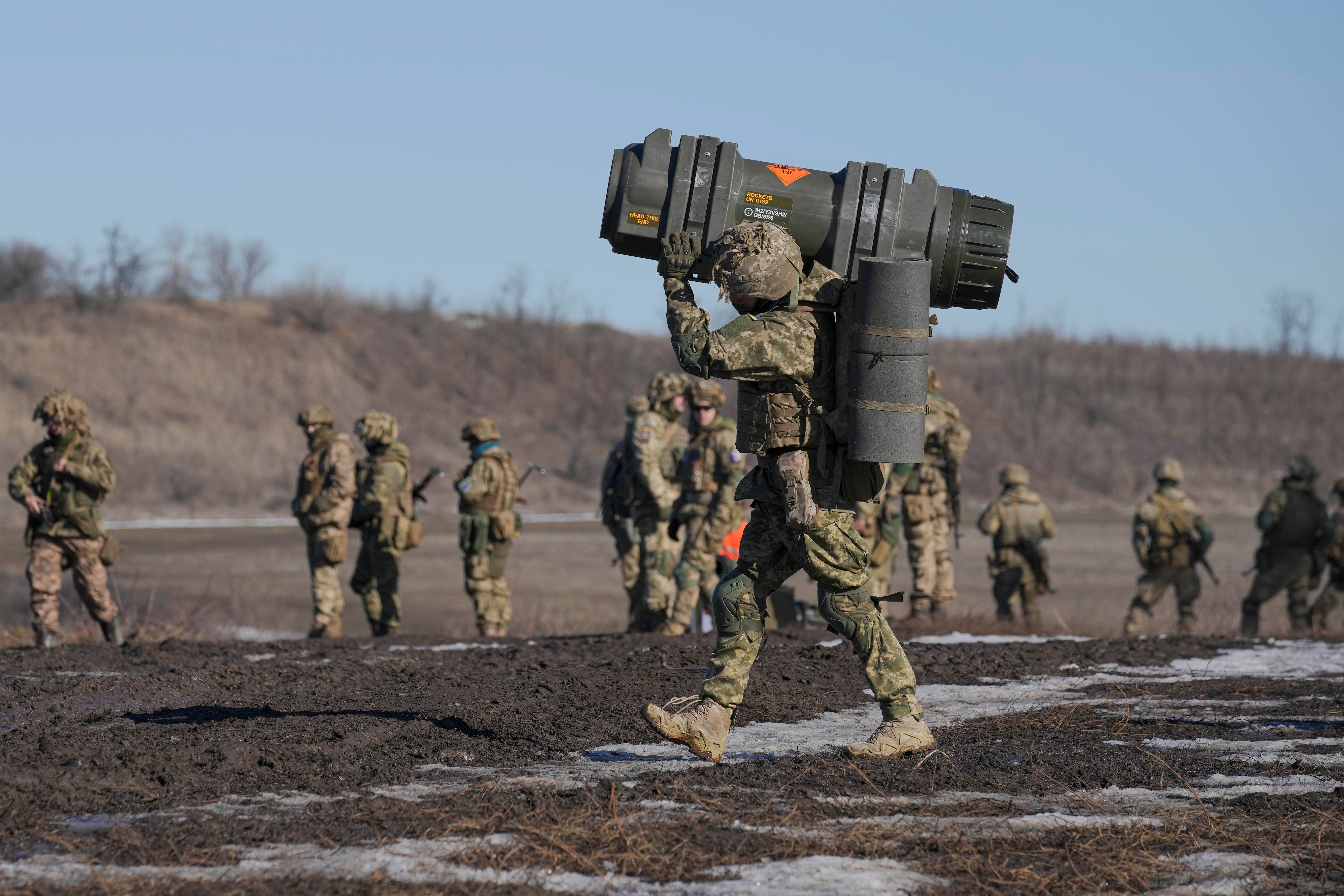 A Ukrainian serviceman carries an NLAW anti-tank weapon during an exercise in the Joint Forces Operation, in the Donetsk region, eastern Ukraine, Tuesday, Feb. 15, 2022. (AP) A Ukrainian serviceman carries an NLAW anti-tank weapon during an exercise in the Joint Forces Operation, in the Donetsk region, eastern Ukraine, Tuesday, Feb. 15, 2022. (AP)