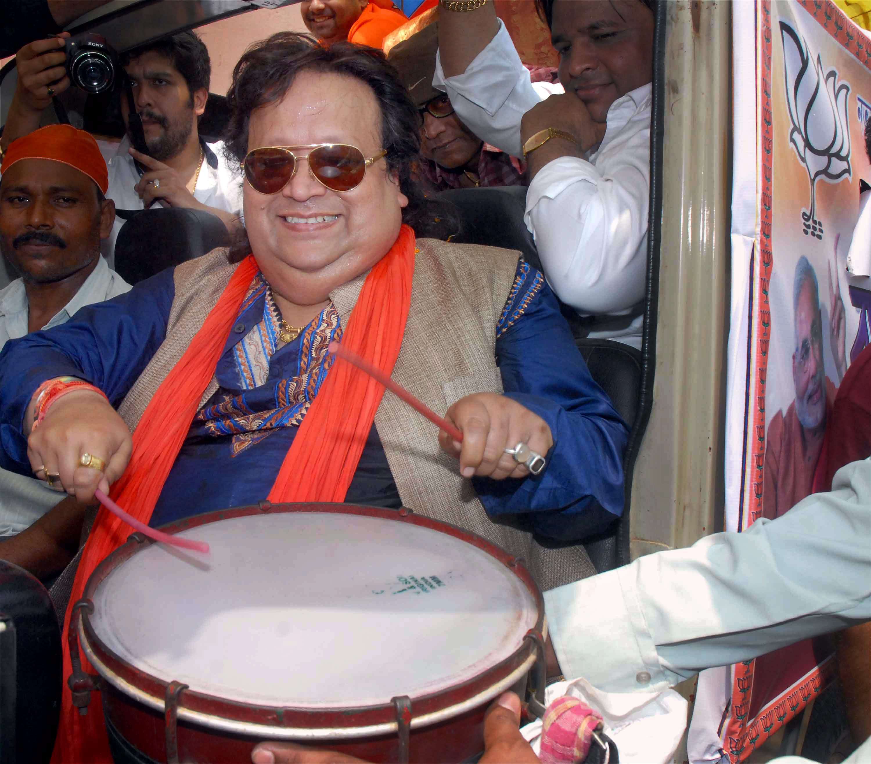 File image of composer Bappi Lahiri beating the drum at an event in Bengal. (PTI) File image of composer Bappi Lahiri beating the drum at an event in Bengal. (PTI)