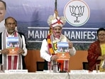 Bharatiya Janata Party (BJP) National President J.P. Nadda (C), Manipur Chief Minister N. Biren Singh (L) and others release the party's manifesto for the Manipur Assembly elections, in Imphal on Thursday.(ANI) Bharatiya Janata Party (BJP) National President J.P. Nadda (C), Manipur Chief Minister N. Biren Singh (L) and others release the party's manifesto for the Manipur Assembly elections, in Imphal on Thursday.(ANI)