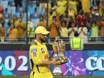 MS Dhoni with the IPL 2021 trophy. MS Dhoni with the IPL 2021 trophy.