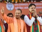 Uttar Pradesh chief minister Yogi Adityanath flashes the victory sign during an election campaign meeting in support of party candidate Rajeshwar Singh at Sarojni Nagar, in Lucknow, on Thursday, February. 17. (PTI Photo/Nand Kumar)
