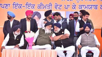 Shiromani Akali Dal patriarch Parkash Singh Badal with his son Sukhbir Badal at his home turf in Lambi on Thursday. (HT Photo) Shiromani Akali Dal patriarch Parkash Singh Badal with his son Sukhbir Badal at his home turf in Lambi on Thursday. (HT Photo)