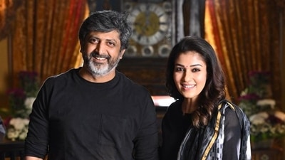 Mohan Raja with Nayanthara on sets of Godfather. Mohan Raja with Nayanthara on sets of Godfather. 