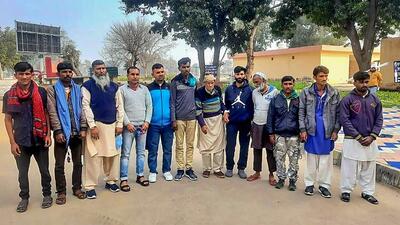 Pakistani fishermen released as a goodwill gesture by the Indian government pose for photographs before crossing the Wagah border, some 35 km from Amritsar on Thursday. (PTI PHOTO.) Pakistani fishermen released as a goodwill gesture by the Indian government pose for photographs before crossing the Wagah border, some 35 km from Amritsar on Thursday. (PTI PHOTO.)