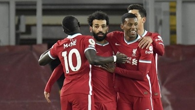 Liverpool's Mohamed Salah celebrates after scoring the opening goal against Wolverhampton Wanderers (AP) Liverpool's Mohamed Salah celebrates after scoring the opening goal against Wolverhampton Wanderers (AP)