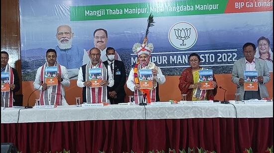 BJP chief JP Nadda, Manipur chief minister N Biren Singh, state unit president A Sharda Devi and others releasing the election manifesto in Imphal on Thursday. (HT PHOTO.) BJP chief JP Nadda, Manipur chief minister N Biren Singh, state unit president A Sharda Devi and others releasing the election manifesto in Imphal on Thursday. (HT PHOTO.)