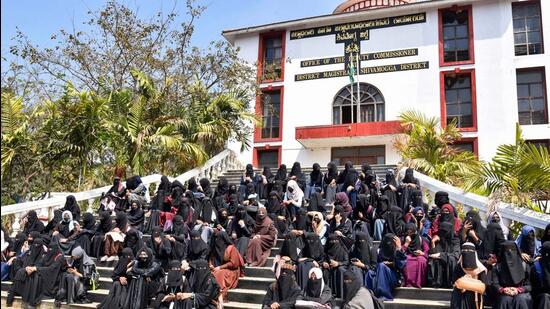In its interim order pending consideration of all petitions related to the hijab row last week, the court restrained all students from wearing saffron shawls, scarves, hijab and any religious flag within the classroom. (PTI)