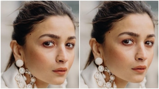 Alia minimally accessorised her look for the day with statement pearl-studded earrings as she posed for the pictures.(Instagram/@aliaabhatt)