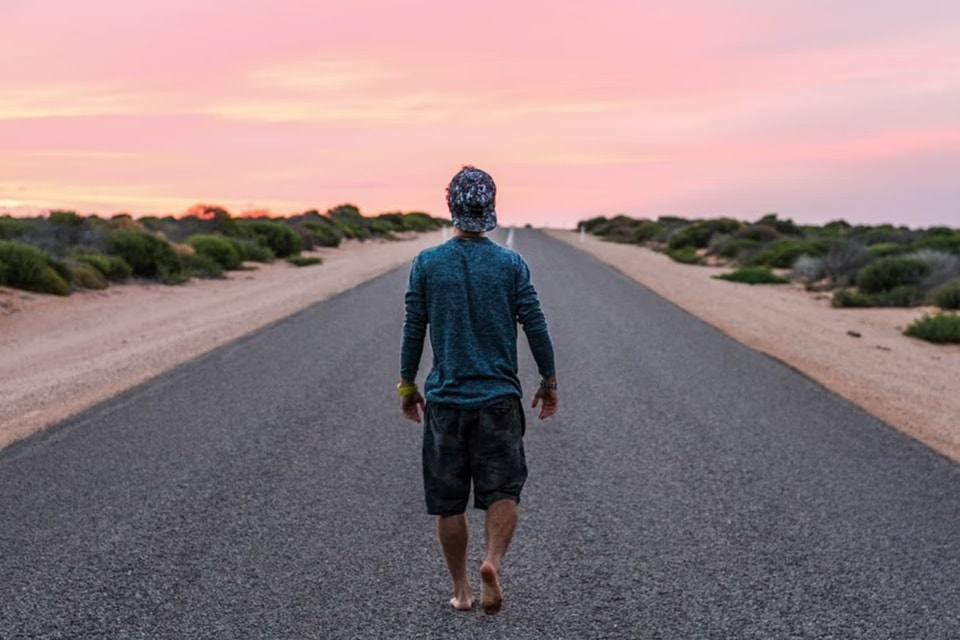 What walking backwards actually does is to engage a different set of muscles - calf muscles, glutes, and quadriceps (Unsplash)