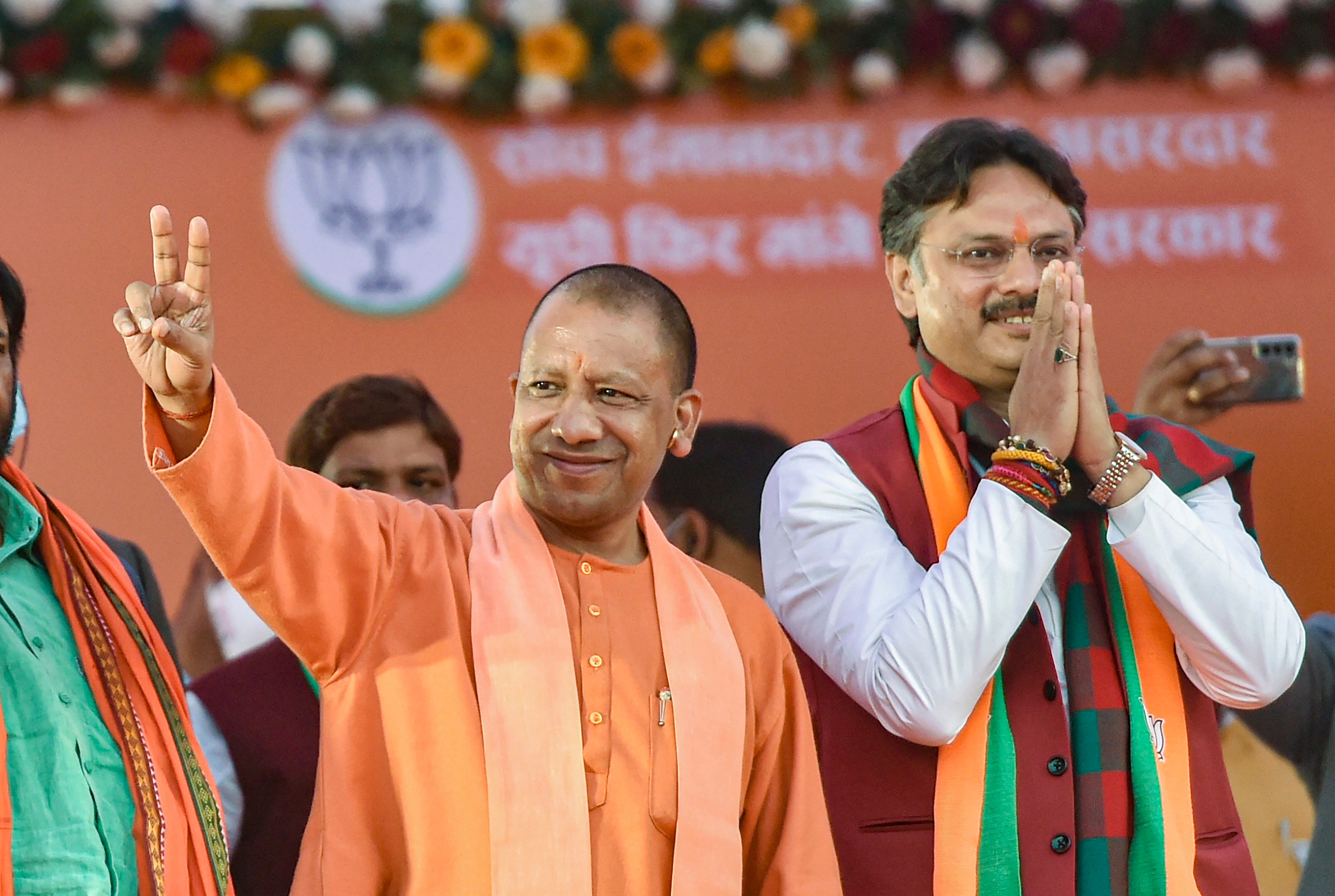Uttar Pradesh chief minister Yogi Adityanath flashes the victory sign during an election campaign meeting in support of party candidate Rajeshwar Singh at Sarojni Nagar, in Lucknow, on Thursday, February. 17. (PTI Photo/Nand Kumar) Uttar Pradesh chief minister Yogi Adityanath flashes the victory sign during an election campaign meeting in support of party candidate Rajeshwar Singh at Sarojni Nagar, in Lucknow, on Thursday, February. 17. (PTI Photo/Nand Kumar)