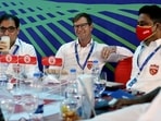 Punjab Kings team head coach Anil Kumble (R), with fielding coach Jonty Rhodes (2R) and others at the Indian Premier League (IPL) 2022 Auction, in Bengaluru on Saturday.
