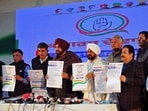 Flanked by Chief Minister Charanjit Singh Channi, Congress leaders Sunil Jakhar, Harish Chaudhary, Rajiv Shukla and Pawan Khera, Sidhu said, “The party manifesto is an instrument for the resurrection of Punjab.”(ANI)