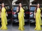 VJ and actor Anusha Dandekar turned heads on Thursday looking all glamorous in a yellow saree with ruffle on its borders.&nbsp;