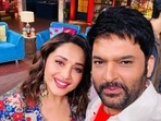 Madhuri Dixit with Kapil Sharma on his show. Madhuri Dixit with Kapil Sharma on his show. 