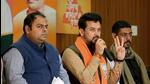 Union Minister of information and broadcasting Anurag Thakur addressing a press conference, at the BJP headquarters, in Chandigarh on Friday. He alleged that Kejriwal has adopted a divisive agenda in desperation to grab power in Punjab. (ANI)