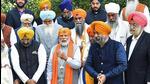 Prime Minister Narendra Modi meets with the Sikh delegation, at Lok Kalyan Marg, in New Delhi on Friday. (ANI)