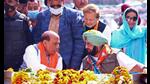 Defence minister Rajnath Singh with Punjab Lok Congress president Capt Amarinder Singh and his wife Lok Sabha MP from Patiala Preneet Kaur during a road show in Patiala on Friday. (ANI)