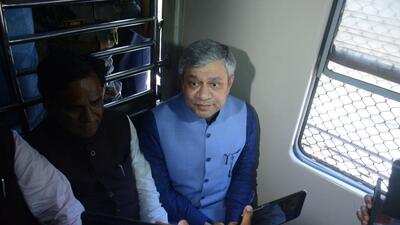 Union Railways Minister Ashwini Vaishnaw and Minister of State for Railways Raosaheb Danve travel by a local train in Thane on Friday. Praful Gangurde/HT Photo Union Railways Minister Ashwini Vaishnaw and Minister of State for Railways Raosaheb Danve travel by a local train in Thane on Friday. Praful Gangurde/HT Photo
