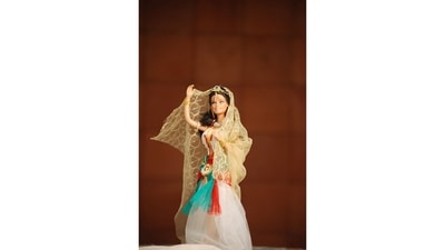 Dressed in lace and tulle, this doll has been repurposed to depict Menaka, the most beautiful of the mythical apsaras. The first thing Devaki did when starting to create her tableaux, she says laughing, was to dye all the dolls’ hair black. (Photo courtesy: S Devaki) Dressed in lace and tulle, this doll has been repurposed to depict Menaka, the most beautiful of the mythical apsaras. The first thing Devaki did when starting to create her tableaux, she says laughing, was to dye all the dolls’ hair black. (Photo courtesy: S Devaki)