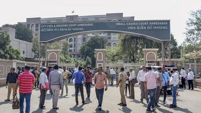 Ahmedabad police and media outside the session court during the sentence day of 2008 Ahmedabad serial bomb blast case, on Friday. (PTI) Ahmedabad police and media outside the session court during the sentence day of 2008 Ahmedabad serial bomb blast case, on Friday. (PTI)
