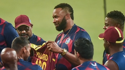 Kolkata: West Indies captain Kieron Pollard with teammates before start of the 2nd T20 cricket match against India, at Eden Garden in Kolkata, Friday,Feb. 18, 2022. Pollard is playing his 100th T20 international match. (PTI) Kolkata: West Indies captain Kieron Pollard with teammates before start of the 2nd T20 cricket match against India, at Eden Garden in Kolkata, Friday,Feb. 18, 2022. Pollard is playing his 100th T20 international match. (PTI)