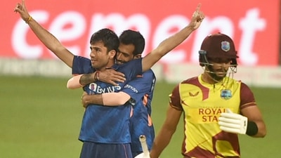 Indian bowler Ravi Bishoni celebrates with his teammate Yuzvendra Chahal after dismissing West Indies batter Brandon King (R) during 2nd T20 cricket match at Eden Garden in Kolkata, Friday,Feb. 18, 2022. (PTI) Indian bowler Ravi Bishoni celebrates with his teammate Yuzvendra Chahal after dismissing West Indies batter Brandon King (R) during 2nd T20 cricket match at Eden Garden in Kolkata, Friday,Feb. 18, 2022. (PTI)