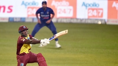 West Indies batsman Rovman Powell plays a shot during 2nd T20 cricket match against India at Eden Garden in Kolkata, Friday, Feb. 18, 2022. (PTI) West Indies batsman Rovman Powell plays a shot during 2nd T20 cricket match against India at Eden Garden in Kolkata, Friday, Feb. 18, 2022. (PTI)