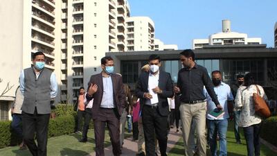 Gurugram, India - February 18: Nishant Kumar Yadav, Deputy Commissioner, and a team from IIT Delhi visit Chintels Paradiso Housing Complex, in Sector 109, Gurugram, India, on Friday, February 18, 2022. (Photo by Parveen Kumar/Hindustan Times) Gurugram, India - February 18: Nishant Kumar Yadav, Deputy Commissioner, and a team from IIT Delhi visit Chintels Paradiso Housing Complex, in Sector 109, Gurugram, India, on Friday, February 18, 2022. (Photo by Parveen Kumar/Hindustan Times)