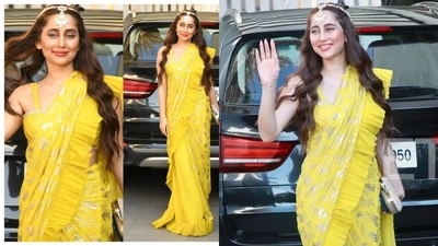 Shibani Dandekar's sister Anusha Dandekar or VJ Anusha as she is popularly known, made jaws drop in a yellow strappy blouse teamed with a yellow base saree that sported gold foil prints all over and ruffles along the pullu and hem. Accessorising her attire with a mathapatti and a bling clutch, Anusha opted for a dewy makeup look.&nbsp; (Instagram/bollywoodarab.fc)