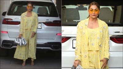 Bollywood hottie Amrita Arora gave traditional festivities a sultry twist in her fusion wear as she stepped out in a lemon yellow crop top, teamed with a pair of matching pants and layered them with a lemon yellow shrug while all the three pieces of the ensemble featured silver foil prints all over. Completing her attire with a pair of heels, Amrita pulled back her mid-parted tresses into a ponytail hairstyle and accessorised her look with a silver handbag and a pair of yellow-tinted sunglasses.&nbsp; (Instagram/eliteshowbiz/bollywoodbubble)
