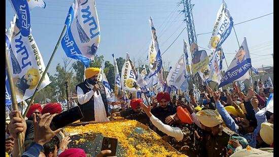 AAP chief ministerial candidate for the Punjab Assembly polls Bhagwant Mann addressing people during a roadshow at Dakha, in Ludhiana on Friday. (ANI)