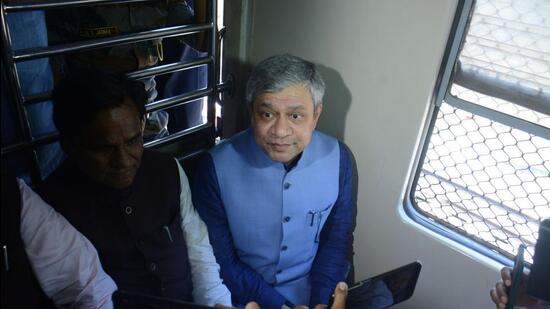 Union Railways Minister Ashwini Vaishnaw and Minister of State for Railways Raosaheb Danve travel by a local train in Thane on Friday. Praful Gangurde/HT Photo