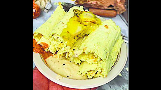 Dosa ice cream roll served with tomato and coconut chutney.