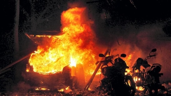 Vehicles on fire after the serial bomb blasts in Ahmedabad, Gujarat. (PTI/File) Vehicles on fire after the serial bomb blasts in Ahmedabad, Gujarat. (PTI/File)