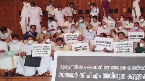 Opposition MLAs stage a protest outside Kerala Assembly on Friday. (ANI Twitter)