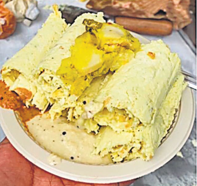 Dosa ice cream roll served with tomato and coconut chutney.