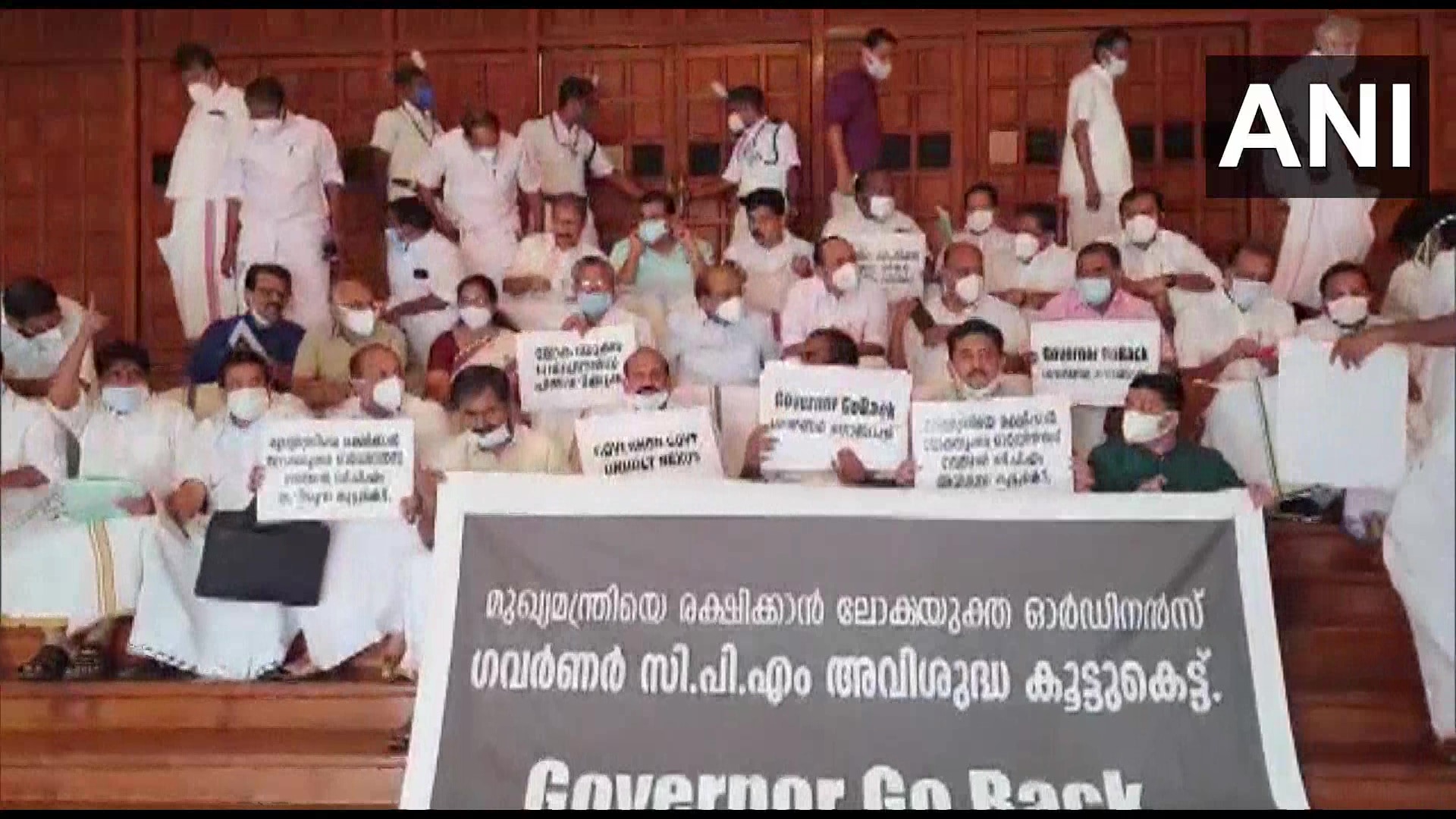 Opposition MLAs stage a protest outside Kerala Assembly on Friday. (ANI Twitter)