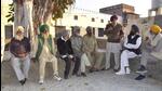 Villagers sitting in Satth (central point where villagers gather for discussions) in Narangwal village, in Ludhiana on Saturday. (Gurpreet Singh/HT) Villagers sitting in Satth (central point where villagers gather for discussions) in Narangwal village, in Ludhiana on Saturday. (Gurpreet Singh/HT)
