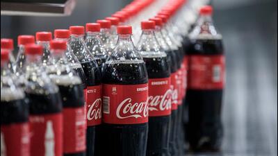 The firms were penalised for charging  ₹60 for a Coca Cola bottle at a Zirakpur mall in 2017, when the same product’s MRP in the market was  ₹35. (Bloomberg)