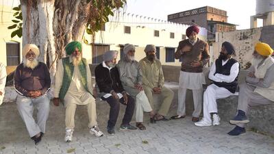 Villagers sitting in Satth (central point where villagers gather for discussions) in Narangwal village, in Ludhiana on Saturday. (Gurpreet Singh/HT) Villagers sitting in Satth (central point where villagers gather for discussions) in Narangwal village, in Ludhiana on Saturday. (Gurpreet Singh/HT)