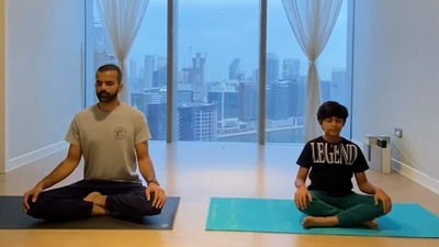 The image taken from the YouTube video shows the nine-year-old Indian boy, Reyash Surani, who became youngest certified yoga instructor. (YouTube/@GWR KIDS)
