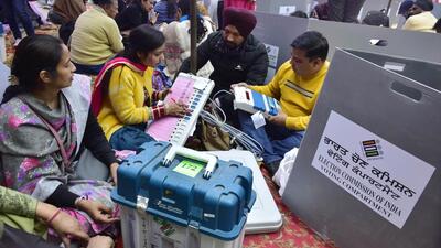 Polling staff examining EVMs and other voting material at a distribution centre on the eve of Punjab elections in Amritsar on Saturday. (Sameer Sehgal/HT) Polling staff examining EVMs and other voting material at a distribution centre on the eve of Punjab elections in Amritsar on Saturday. (Sameer Sehgal/HT)