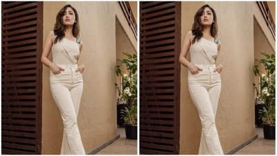 Yami paired an ivory white sleeveless top with black leather sleeve details, with a pair of high-waisted white trousers with wide legs and a small slit at the sides. (Instagram/@yamigautam)