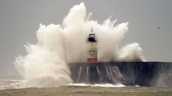 Storm Eunice battered northwestern Europe on Friday with record winds of up to 122 miles per hour. The Atlantic storm killed at least nine people, knocking out power for tens of thousands and shredding the roof of London's O2 Arena.(AFP)