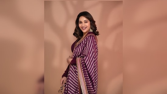 Madhuri Dixit teamed her Anarkali with a hand-embroidered handloom dupatta and churidar.(Instagram/@madhuridixitnene)