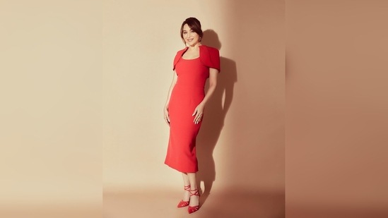 Madhuri Dixit had earlier dropped pictures of herself in a sleek red dress and made fans go gaga over her look.(Instagram/@madhuridixitnene)