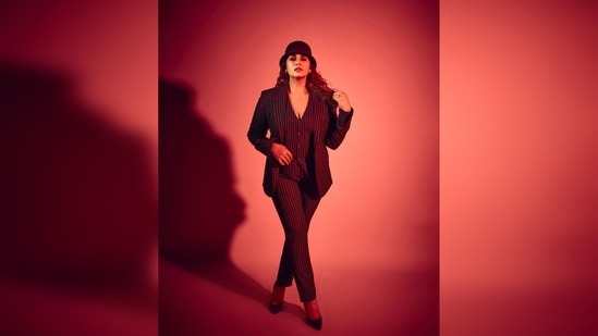 Huma Qureshi ditched fancy gowns and dresses and opted for this bold chic black and white pantsuit teamed with a waistcoat.(Instagram/@iamhumaq)
