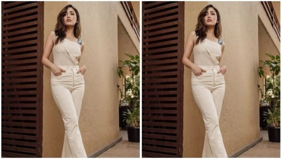 Yami paired an ivory white sleeveless top with black leather sleeve details, with a pair of high-waisted white trousers with wide legs and a small slit at the sides.(Instagram/@yamigautam)