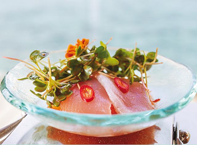 Local white fish sashimi from Out of the Blue’s sushi counter, which is manned by a chef from a three-star restaurant in Tokyo Local white fish sashimi from Out of the Blue’s sushi counter, which is manned by a chef from a three-star restaurant in Tokyo