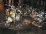 Charred remains of vehicles and a victim at one of the site of 2008 Ahmedabad serial blasts. A special court awarded the death sentence to 38 convicts for their involvement in the blasts, on February 18, 2022.
